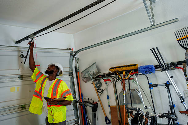Professional Garage Door Maintenance technician working in Sanger, CA